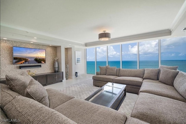 10 Seagate Dr Unit 10N, Naples, FL 34103 - living room featuring a water view, crown molding, and recessed lighting