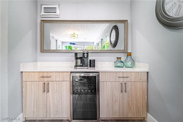 778 98th Ave N, Naples, FL 34108 - indoor dry bar featuring wine cooler and baseboards