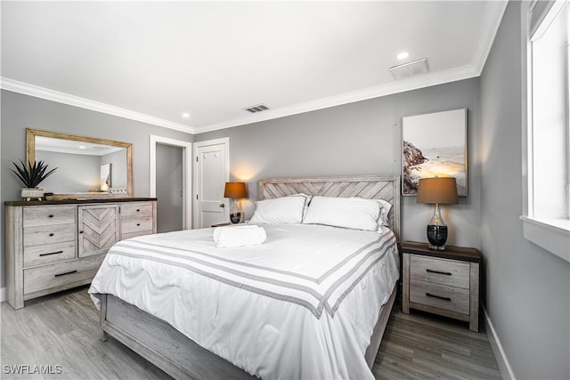 778 98th Ave N, Naples, FL 34108 - bedroom featuring wood finished floors, ornamental molding, and recessed lighting