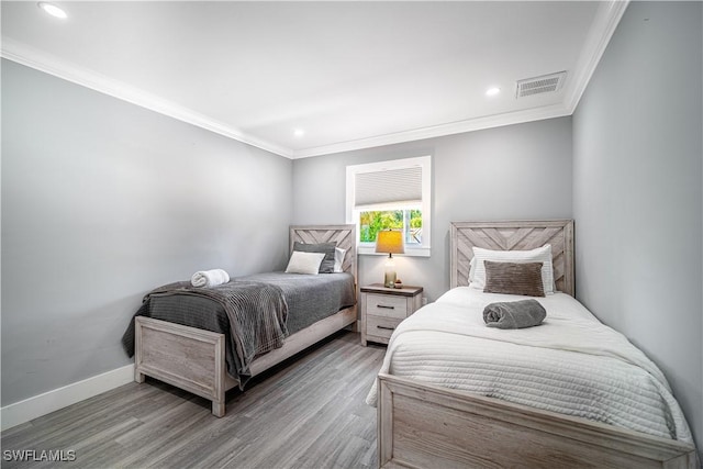 778 98th Ave N, Naples, FL 34108 - bedroom featuring wood finished floors, ornamental molding, and recessed lighting