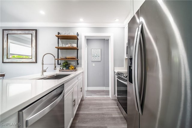 778 98th Ave N, Naples, FL 34108 - kitchen featuring appliances with stainless steel finishes, open shelves, white cabinets, light countertops, and crown molding