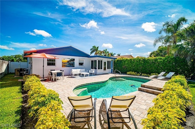 778 98th Ave N, Naples, FL 34108 - view of pool featuring a patio area and a fenced backyard