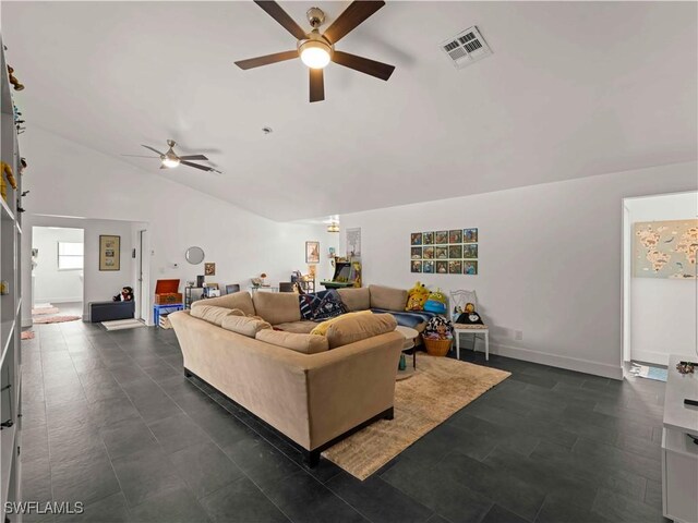 17577 Moorfield Dr, Fort Myers, FL 33908 - living room featuring a ceiling fan and lofted ceiling