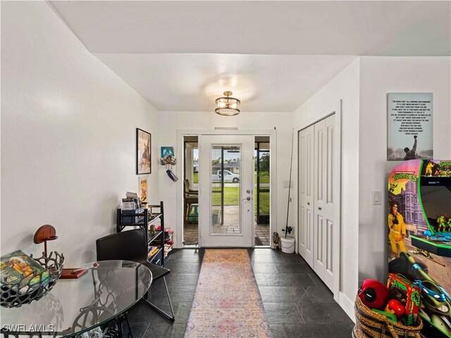 17577 Moorfield Dr, Fort Myers, FL 33908 - foyer entrance featuring baseboards