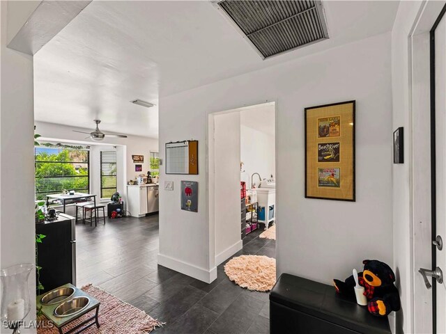 17577 Moorfield Dr, Fort Myers, FL 33908 - corridor featuring baseboards and dark wood-style flooring