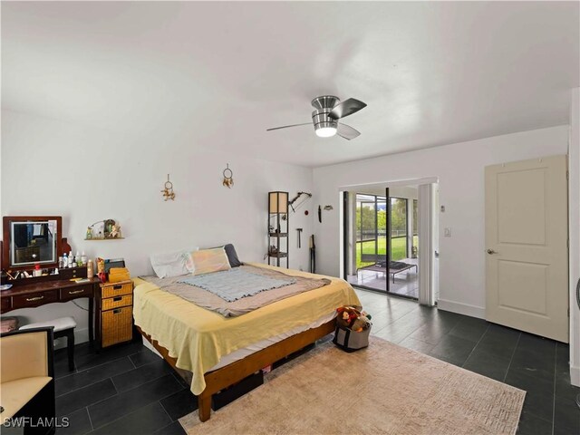 17577 Moorfield Dr, Fort Myers, FL 33908 - bedroom featuring access to outside, dark tile patterned floors, and a ceiling fan