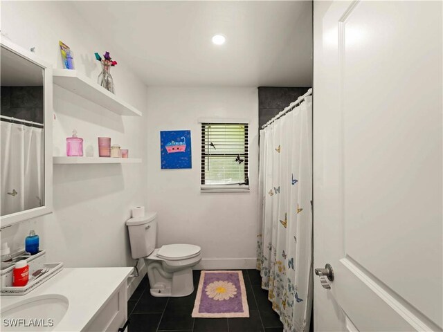 17577 Moorfield Dr, Fort Myers, FL 33908 - full bath with tile patterned floors, vanity, and a shower with shower curtain