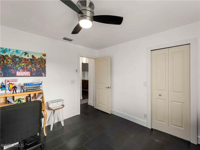 17577 Moorfield Dr, Fort Myers, FL 33908 - home office with a ceiling fan and baseboards