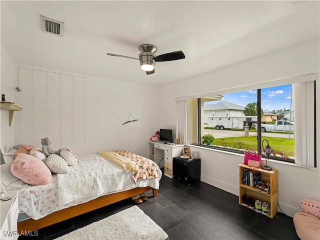 17577 Moorfield Dr, Fort Myers, FL 33908 - tiled bedroom featuring ceiling fan and baseboards