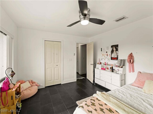 17577 Moorfield Dr, Fort Myers, FL 33908 - bedroom featuring a ceiling fan and a closet