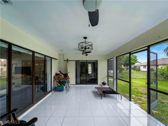 17577 Moorfield Dr, Fort Myers, FL 33908 - unfurnished sunroom featuring a ceiling fan