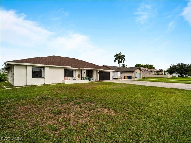 17577 Moorfield Dr, Fort Myers, FL 33908 - ranch-style home featuring driveway, an attached garage, a front yard, and stucco siding
