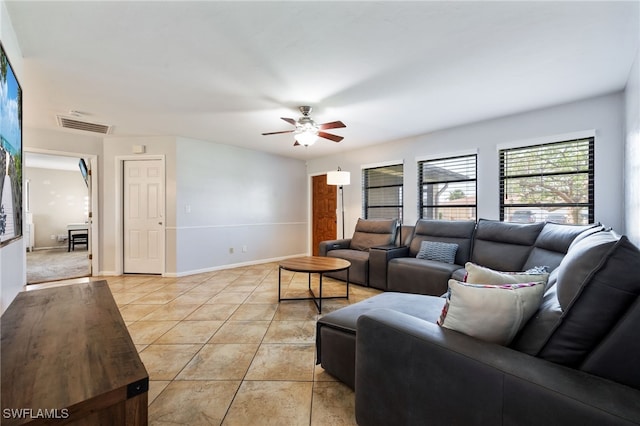 1831 SE 6th St, Cape Coral, FL 33990 - living area featuring a ceiling fan and light tile patterned flooring