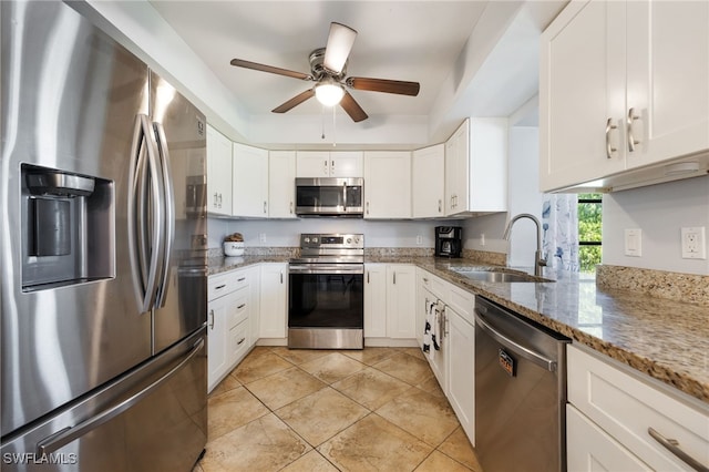 1831 SE 6th St, Cape Coral, FL 33990 - kitchen featuring stainless steel appliances, ceiling fan, white cabinets, and light tile patterned floors