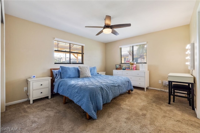 1831 SE 6th St, Cape Coral, FL 33990 - carpeted bedroom with baseboards and ceiling fan
