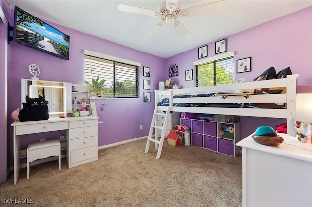 1831 SE 6th St, Cape Coral, FL 33990 - carpeted bedroom with multiple windows and a ceiling fan