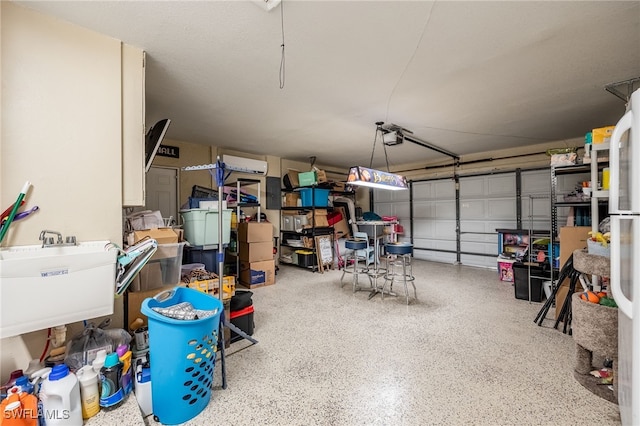 1831 SE 6th St, Cape Coral, FL 33990 - garage with a garage door opener and a sink