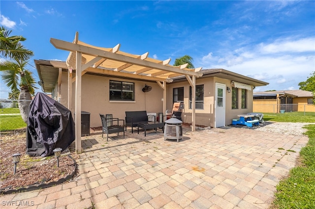 1831 SE 6th St, Cape Coral, FL 33990 - back of house with stucco siding, a pergola, and a patio