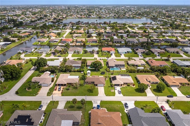 1831 SE 6th St, Cape Coral, FL 33990 - aerial view of property's location with nearby suburban area and a nearby body of water