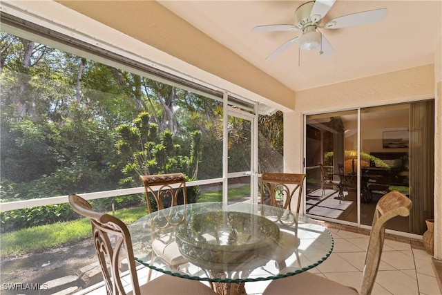 4718 Via Carmen, Naples, FL 34105 - sunroom with ceiling fan, outdoor dining space, and healthy amount of natural light