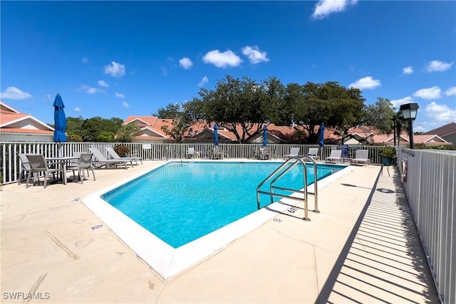 4718 Via Carmen, Naples, FL 34105 - community pool with a patio