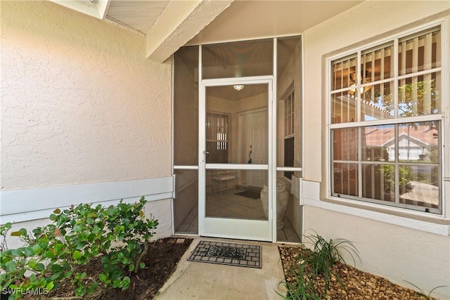 4718 Via Carmen, Naples, FL 34105 - property entrance featuring stucco siding