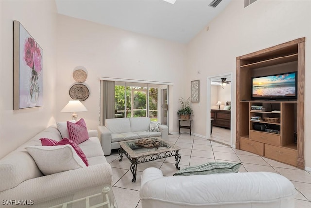 4718 Via Carmen, Naples, FL 34105 - living area featuring a high ceiling and light tile patterned flooring