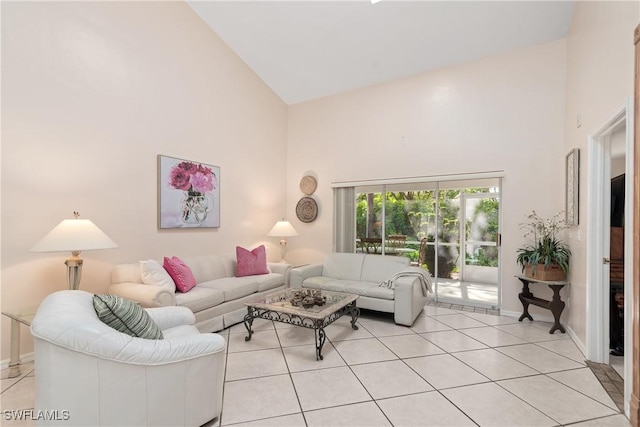 4718 Via Carmen, Naples, FL 34105 - living room featuring high vaulted ceiling and light tile patterned flooring