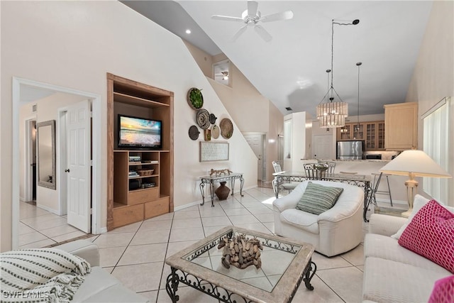 4718 Via Carmen, Naples, FL 34105 - living area featuring high vaulted ceiling, a ceiling fan, a chandelier, and light tile patterned floors