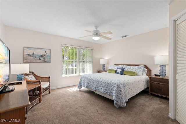 4718 Via Carmen, Naples, FL 34105 - carpeted bedroom with ceiling fan and a closet