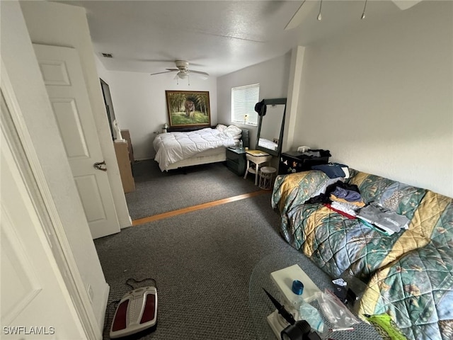 210 NE 9th Place, Cape Coral, FL 33909 - bedroom with carpet floors and a ceiling fan