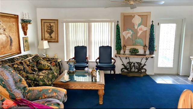 210 NE 9th Place, Cape Coral, FL 33909 - living area with ceiling fan and healthy amount of natural light