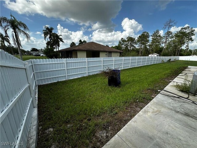 904 James Ave, Lehigh Acres, FL 33936 - view of fenced backyard