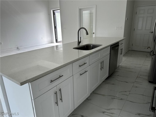 904 James Ave, Lehigh Acres, FL 33936 - kitchen featuring dishwasher, light marble finish flooring, white cabinets, and light stone countertops