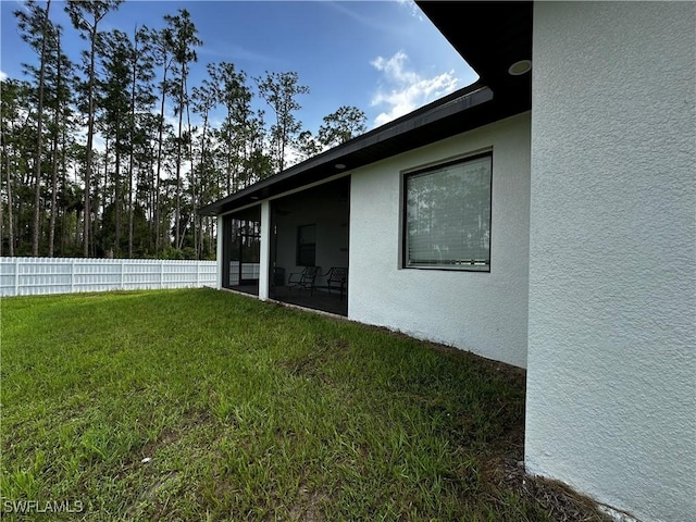 904 James Ave, Lehigh Acres, FL 33936 - view of yard featuring a sunroom