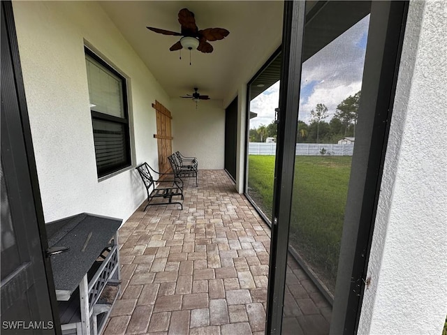 904 James Ave, Lehigh Acres, FL 33936 - sunroom / solarium featuring a ceiling fan