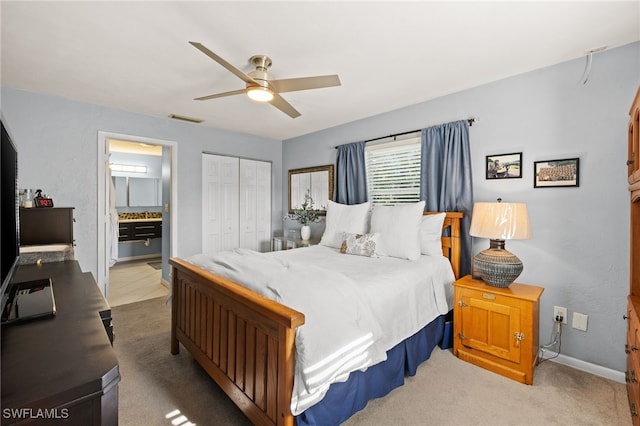 134 Palm River Blvd, Naples, FL 34110 - bedroom featuring a closet, a ceiling fan, and ensuite bathroom