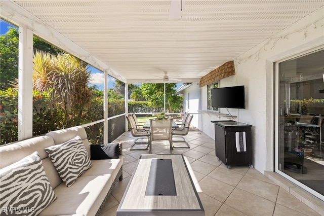 134 Palm River Blvd, Naples, FL 34110 - sunroom featuring an outdoor hangout area, a ceiling fan, and outdoor dining space