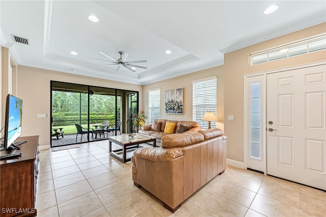 8257 Lucello Ter W, Naples, FL 34114 - living area with ceiling fan, crown molding, a tray ceiling, light tile patterned flooring, and recessed lighting