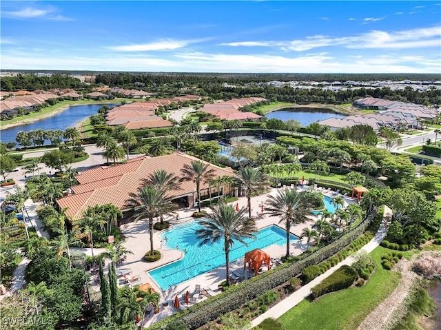 8257 Lucello Ter W, Naples, FL 34114 - aerial perspective of suburban area featuring a pool area and a large body of water