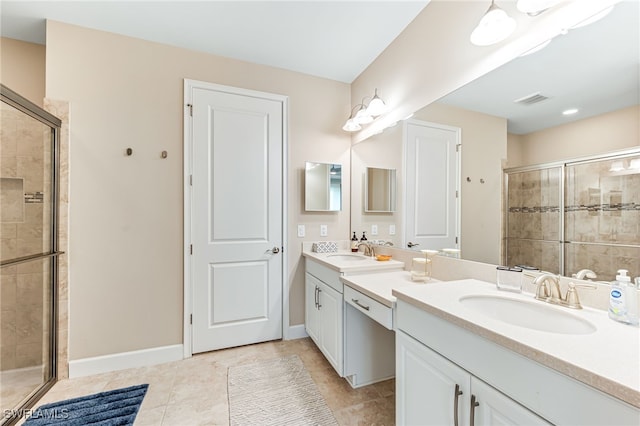 8257 Lucello Ter W, Naples, FL 34114 - full bathroom with double vanity, a stall shower, and tile patterned flooring