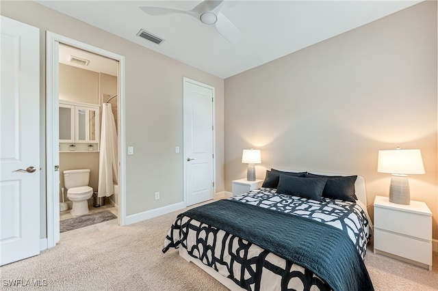 8257 Lucello Ter W, Naples, FL 34114 - bedroom featuring light colored carpet, connected bathroom, and ceiling fan
