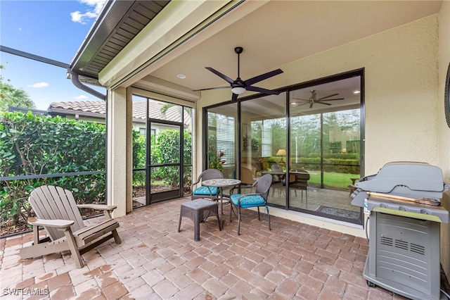 8257 Lucello Ter W, Naples, FL 34114 - sunroom / solarium featuring ceiling fan and plenty of natural light