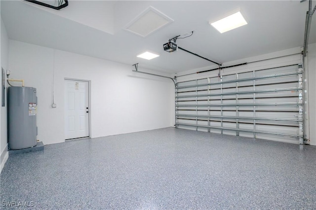 1144 Monday St, Labelle, FL 33935 - garage featuring water heater and a garage door opener