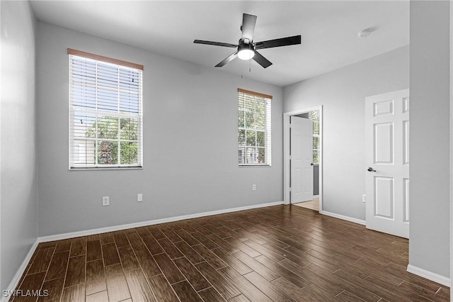 3258 Tamara Dr Unit 2, Naples, FL 34109 - unfurnished bedroom featuring dark wood-style floors and ceiling fan