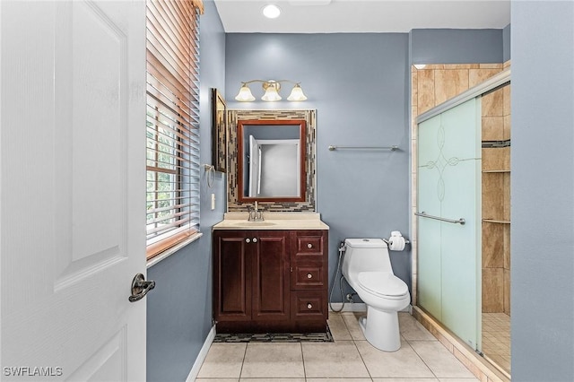 3258 Tamara Dr Unit 2, Naples, FL 34109 - bathroom featuring vanity, a stall shower, and tile patterned flooring