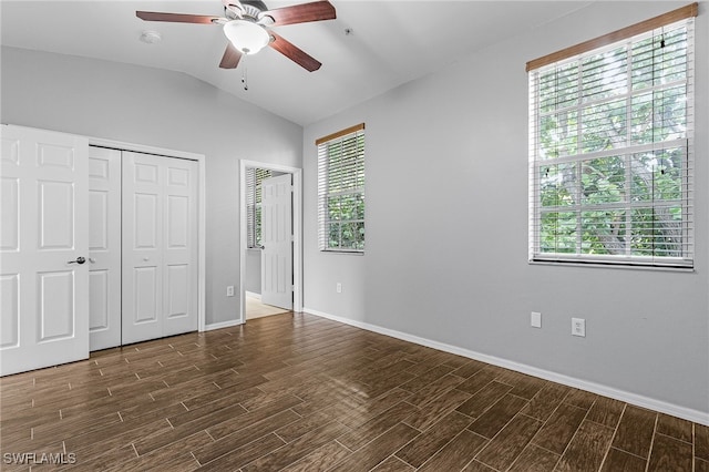 3258 Tamara Dr Unit 2, Naples, FL 34109 - unfurnished bedroom featuring dark wood-type flooring, lofted ceiling, and ceiling fan