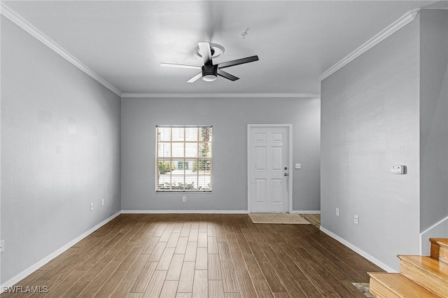 3258 Tamara Dr Unit 2, Naples, FL 34109 - unfurnished room with a ceiling fan, wood finished floors, stairway, and ornamental molding