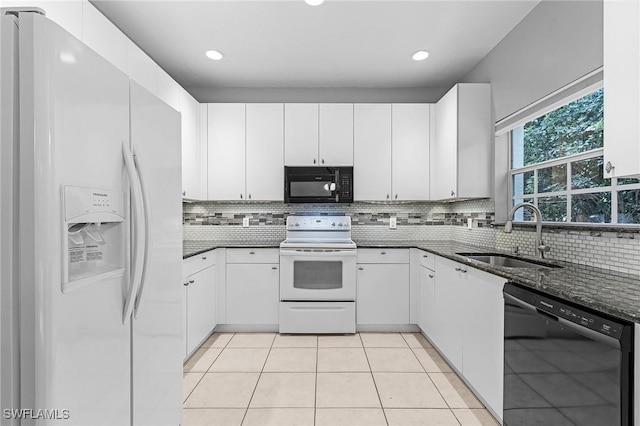 3258 Tamara Dr Unit 2, Naples, FL 34109 - kitchen featuring black appliances, decorative backsplash, white cabinetry, dark stone countertops, and recessed lighting