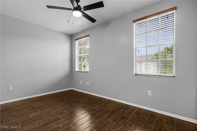 3258 Tamara Dr Unit 2, Naples, FL 34109 - unfurnished room featuring dark wood-type flooring and a ceiling fan